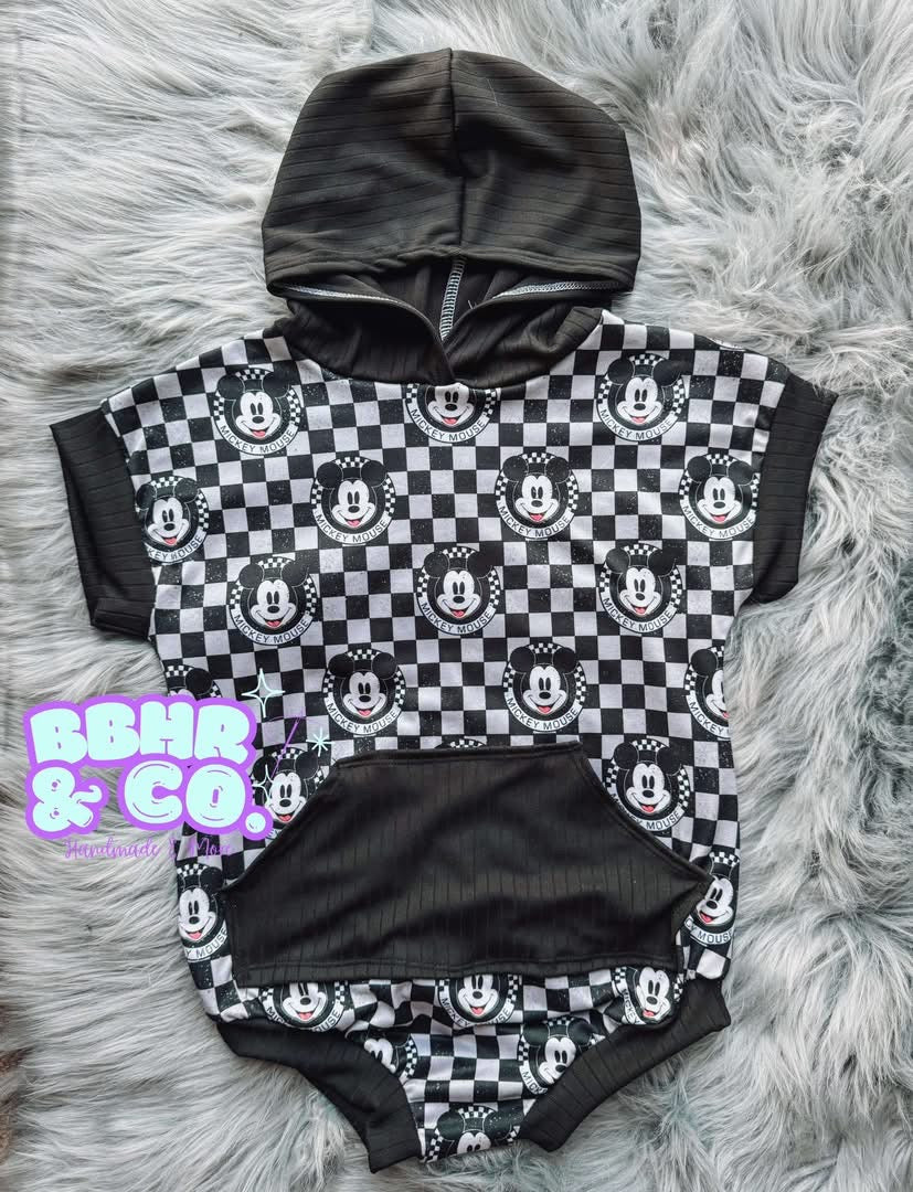 Oversized hooded romper with front pocket